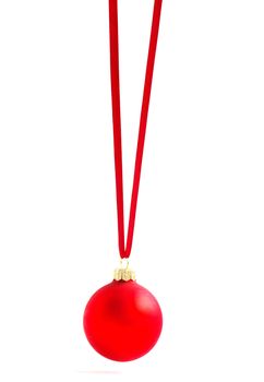 Christmas ball hanging with ribbons on white background