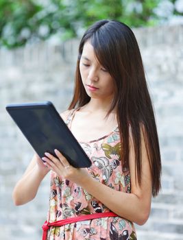 young woman using tablet touch computer