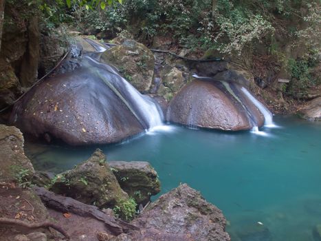 Emerald color water in tier fourth of Erawan waterfall, Erawan National Park, Kanchanaburi, Thailand