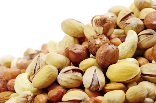 Assorted mixed nuts on white background