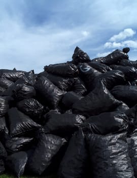 Large group of Garbage Bags towards blue sky