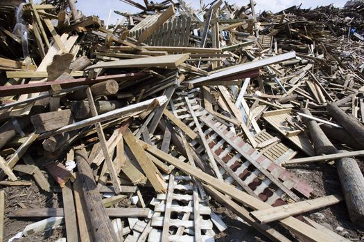 Heap of Wood Garbage in front of blue sky