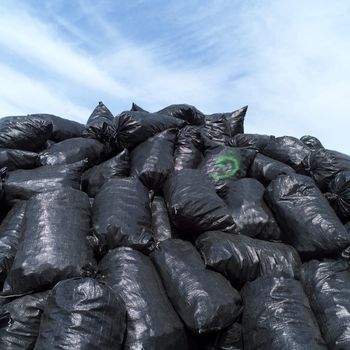 Large group of Garbage Bags towards blue sky