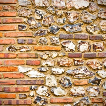 An interesting detailed sqaure background image of a flint and brick wall