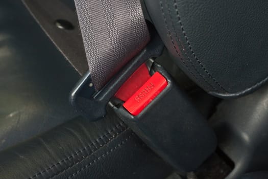 Close up image of  a fastened seat beltseatbelt,
