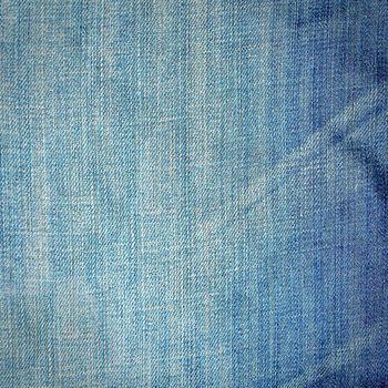 Striking background image of denim material with creases