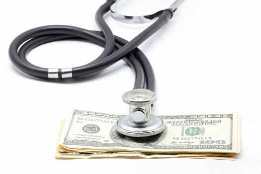 Stethoscope on Money Dollar Cash Currency Banknote Background Using for Healthy Financial and Insurance Concept