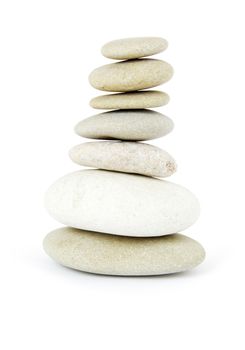 Stack of balanced stones on a white background