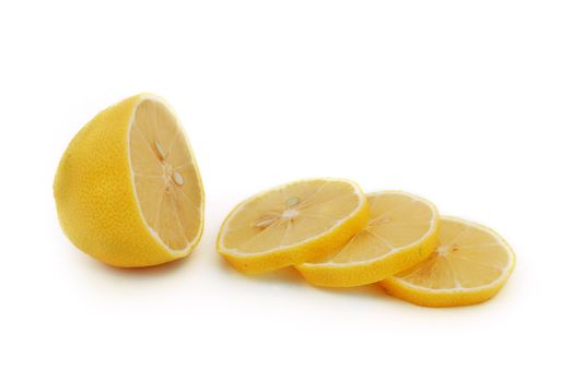 chopped lemon slices on white background
