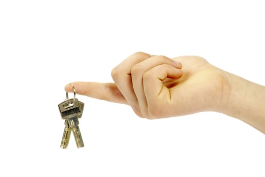 hand holds a key isolated on white