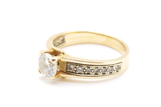 Gold wedding rings isolated on white background
