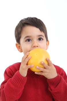 A child with a grapefruit on white background