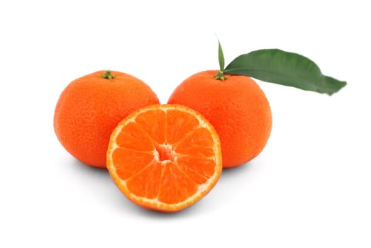 tangerines with leaves on white background