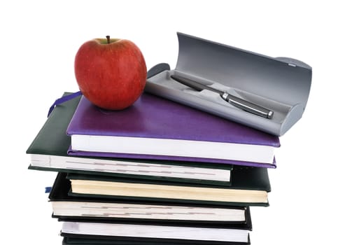 apple and books on a white background