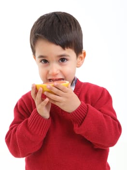 A child with a grapefruit on white background