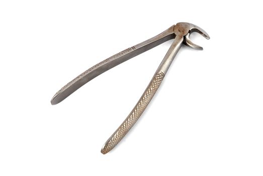 old dental pliers on a white background