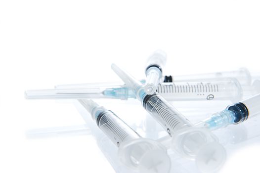 A 2ml syringe and needle. Disposable syringe. Blur