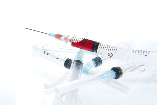 A 2ml syringe and needle. Disposable syringe. Blur