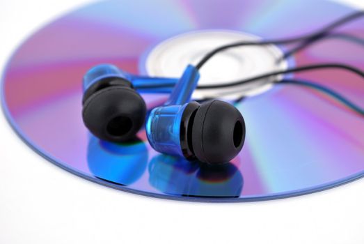 headphones and cd drive on a white background