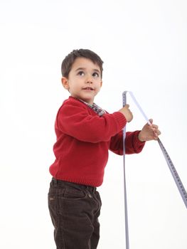 Isolated on white young boy play with meter