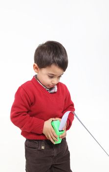 Isolated on white young boy play with meter