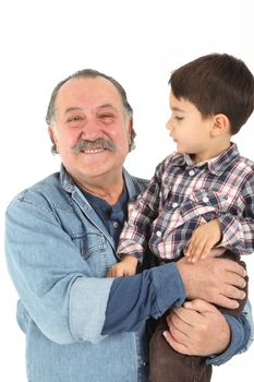 Child and grandfather stay together on white background