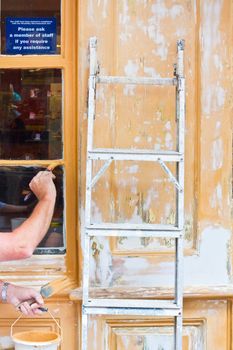 Painting a wooden window frame