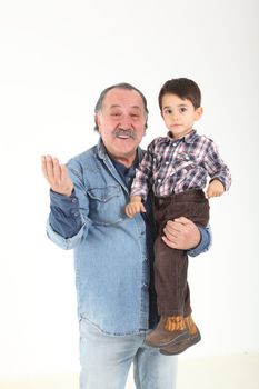 Child and grandfather stay together on white background