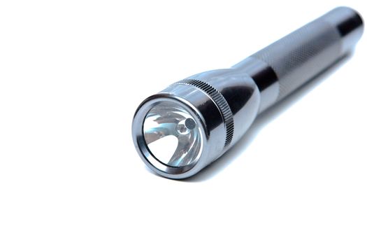 A modern chroma flashlight on white background