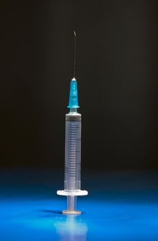Ready and isolated medical syringe standing head up