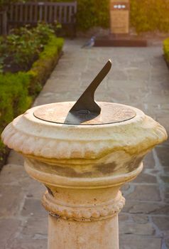 Nice sundial backlit by late afternoon sun