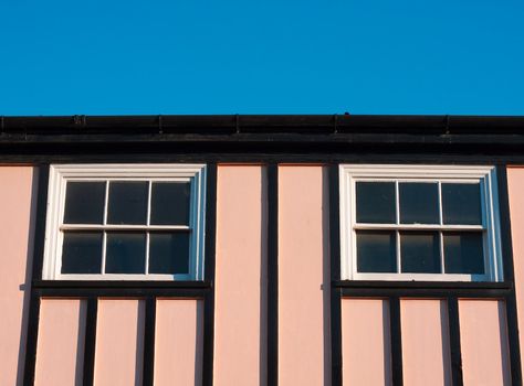 Striking pink house and a bright blue sky
