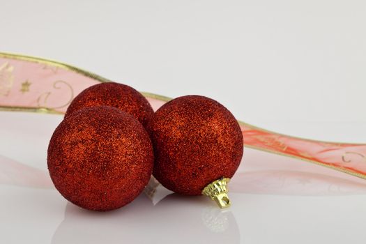 Red Christmas Baubles with red ribbon.