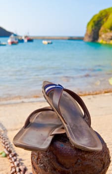 sandals by the beach