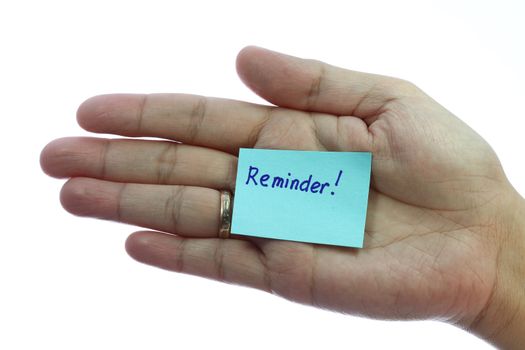 Woman hand holding blank notepaper with reminder on pure white background
