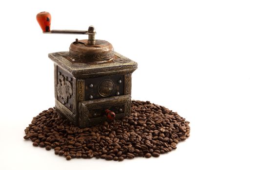 antique coffee grinder on white