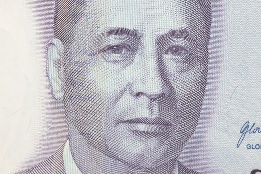 Macro photo of Manuel Roxas 100 Philippines peso.