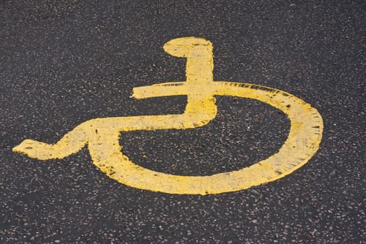 yellow disabled sign