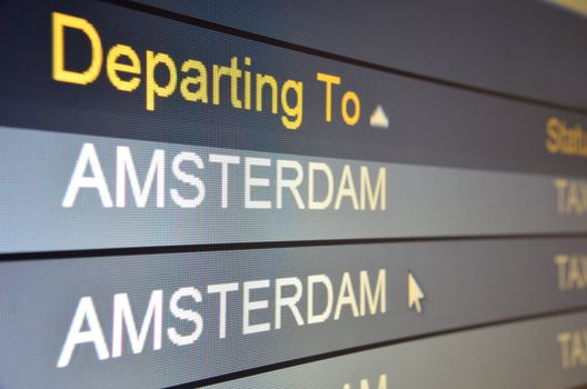Computer screen closeup of Amsterdam flight status