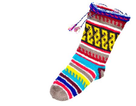 A wonderfully vibrant woollen stocking as a cut out