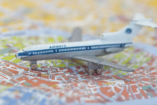 Toy Airplane on map of venice, Shallow depth of field from use of macro lens. 
