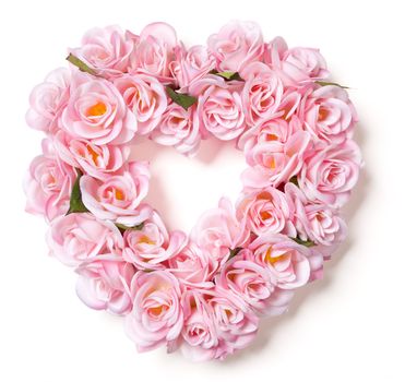 Heart Shaped Pink Rose Arrangement on a White Background.