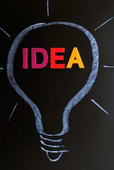 Idea - colorful word in a chalk-drawn bulb