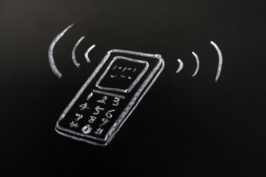Cellphone drawn in chalk on a blackboard