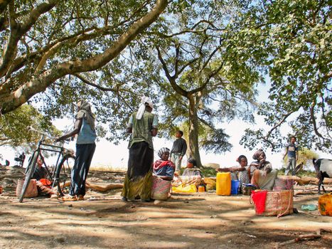 Local fisherment awaiting for customers to buy the days catch