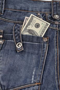 dollars in his back pocket Jeans. close-up