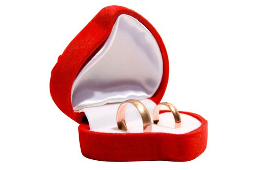 Wedding ring in red gift box isolated on the white background.