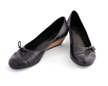 black ladies shoes on a white background