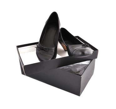 black ladies shoes and box  on a white background