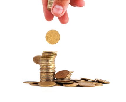 pile of gold coins on a white background